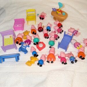 Large lot of Peppa pig figures mixed with furniture